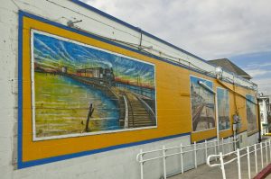 A Mural of trains and the boardwalk in Ocean City